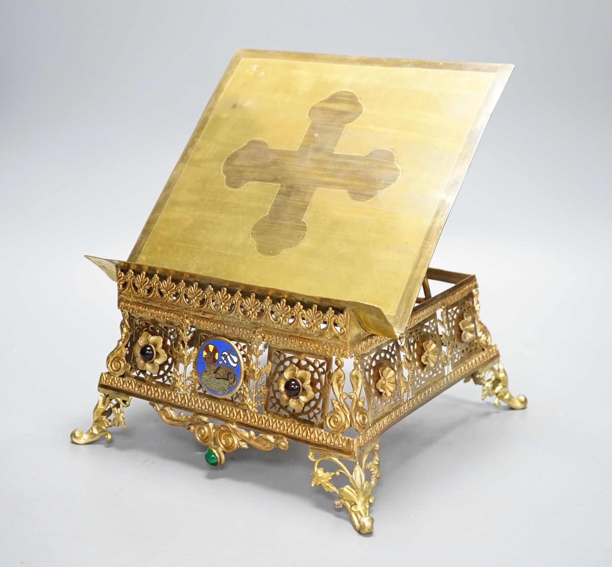 A 19th century gilt brass bible stand